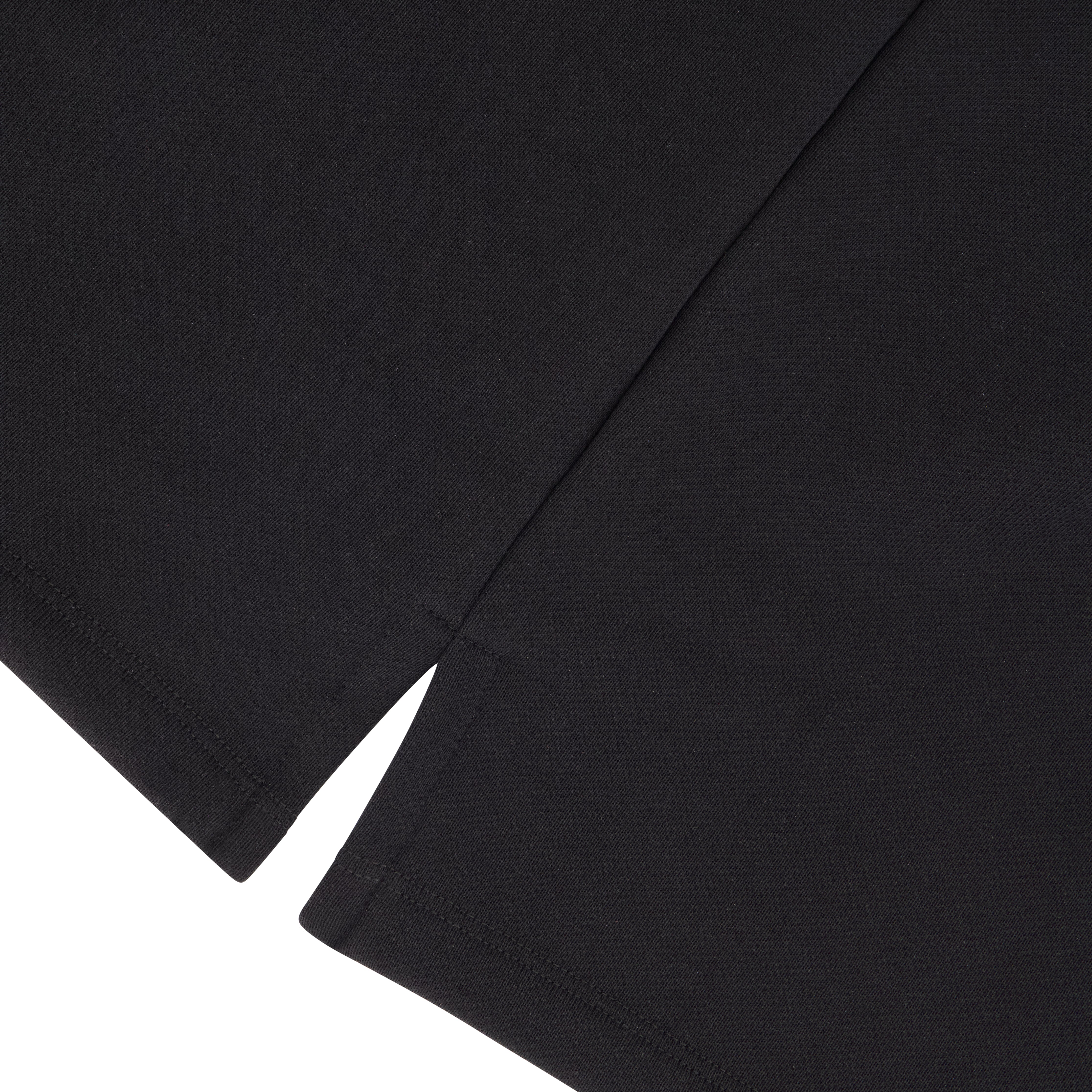 Split hem detail of Urbane Noir TWO crewneck sweatshirt – versatile layering style